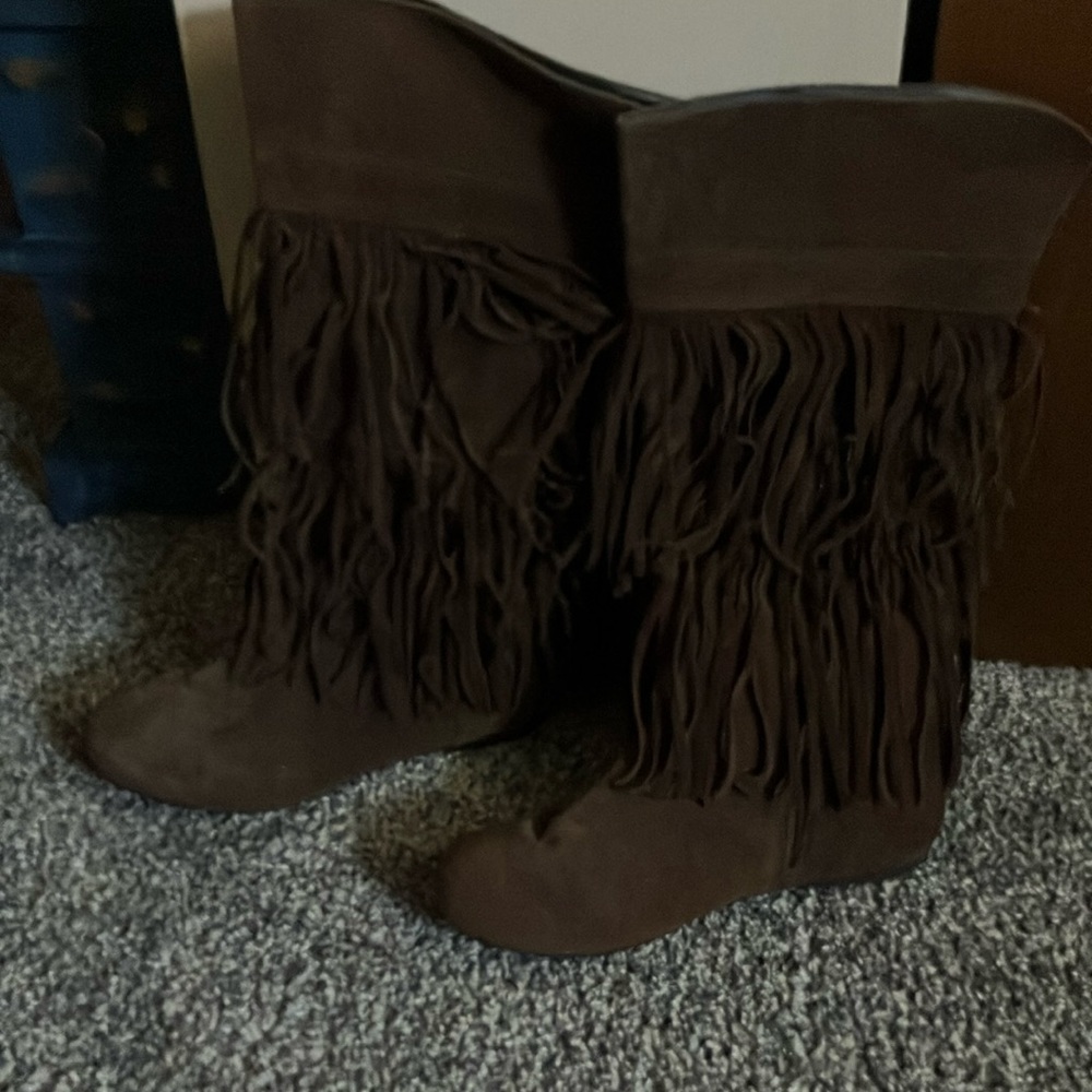 Women’s moccasin knee high boots